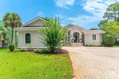 This pristine coastal retreat in Driftwood Estates is placed on - photo 6