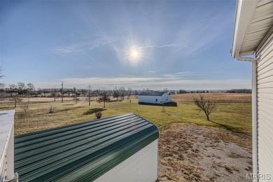 Versatile Estate on 9.8 Acres with Dual Living Quarters & Income