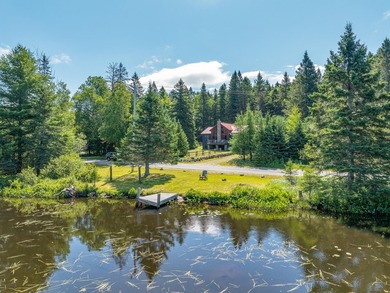 Direct waterfront on Lake Abanakee comes with this well-built - photo 2