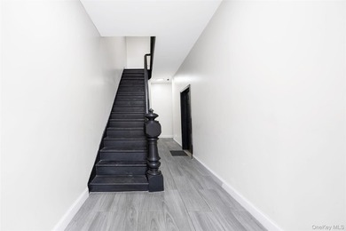 Fully Renovated Three-Family Homes - Strong Investment - photo 12