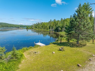 Direct waterfront on Lake Abanakee comes with this well-built - photo 3