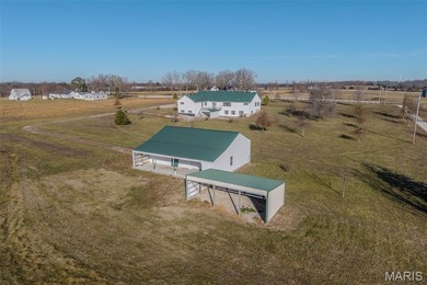 Versatile Estate on 9.8 Acres with Dual Living Quarters & Income