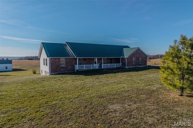 Versatile Estate on 9.8 Acres with Dual Living Quarters & Income