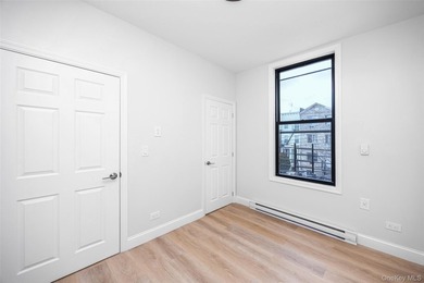 Fully Renovated Three-Family Homes - Strong Investment - photo 14
