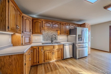 Versatile Estate on 9.8 Acres with Dual Living Quarters & Income