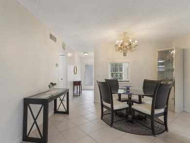 Enjoy easy Florida living in this beautifully maintained and - photo 1