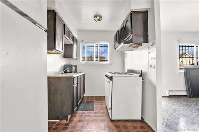 Welcome to 115-36 157th Street, a spacious two-family home in - photo 4