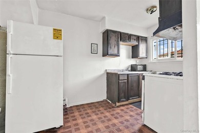 Welcome to 115-36 157th Street, a spacious two-family home in - photo 5