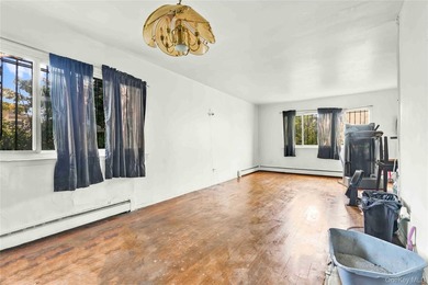 Welcome to 115-36 157th Street, a spacious two-family home in - photo 6