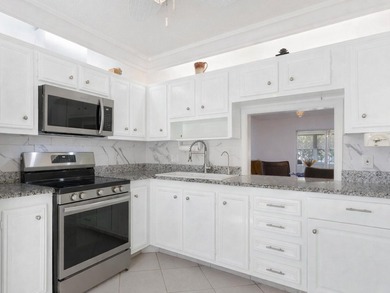 Enjoy easy Florida living in this beautifully maintained and - photo 6