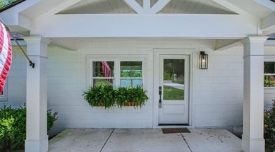 This Lake Home is truly a rare gem! Nestled along 165 Feet of - photo 11