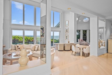 Set high on a scenic bluff in New Seabury, this contemporary - photo 11