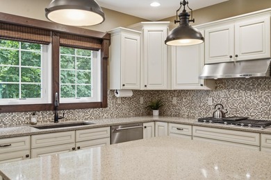 Welcome to this exceptional two-story walkout nestled on a - photo 11