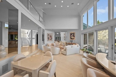 Set high on a scenic bluff in New Seabury, this contemporary - photo 12