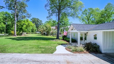 This Lake Home is truly a rare gem! Nestled along 165 Feet of - photo 13