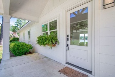 This Lake Home is truly a rare gem! Nestled along 165 Feet of - photo 15