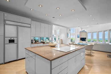 Set high on a scenic bluff in New Seabury, this contemporary - photo 15