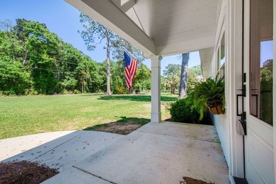 This Lake Home is truly a rare gem! Nestled along 165 Feet of - photo 16