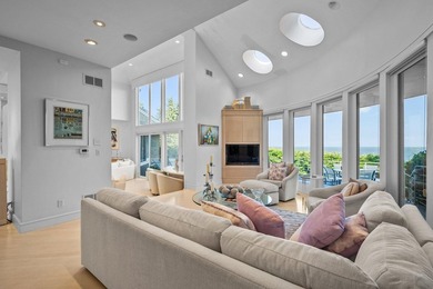 Set high on a scenic bluff in New Seabury, this contemporary - photo 17
