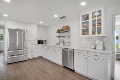 This Lake Home is truly a rare gem! Nestled along 165 Feet of - photo 18