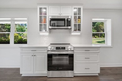 This Lake Home is truly a rare gem! Nestled along 165 Feet of - photo 19