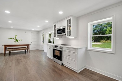 This Lake Home is truly a rare gem! Nestled along 165 Feet of - photo 24
