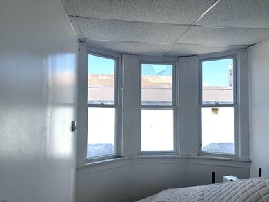 This is a triplex with a lot of potential. The building has 2 - photo 4
