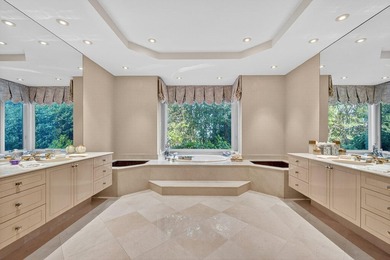 Set high on a scenic bluff in New Seabury, this contemporary - photo 25