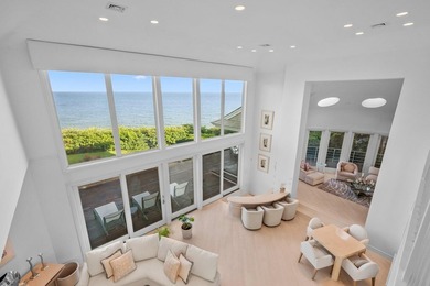 Set high on a scenic bluff in New Seabury, this contemporary - photo 27