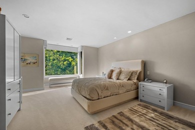 Set high on a scenic bluff in New Seabury, this contemporary - photo 28