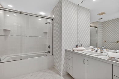 Set high on a scenic bluff in New Seabury, this contemporary - photo 31
