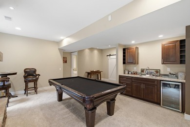 Welcome to this exceptional two-story walkout nestled on a - photo 32