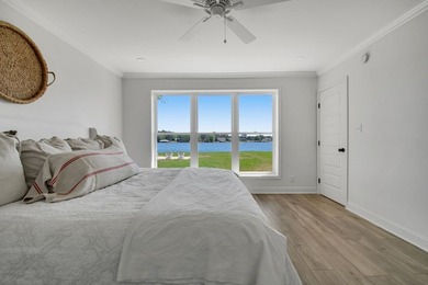 This Lake Home is truly a rare gem! Nestled along 165 Feet of - photo 33