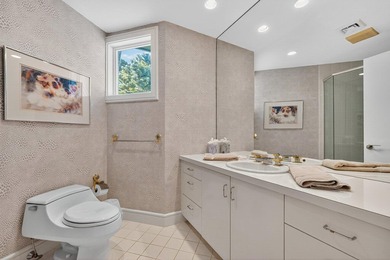 Set high on a scenic bluff in New Seabury, this contemporary - photo 33
