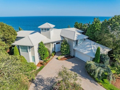 Set high on a scenic bluff in New Seabury, this contemporary - photo 39
