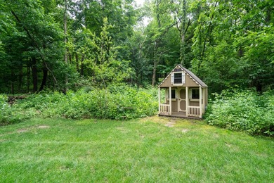 Welcome to this exceptional two-story walkout nestled on a - photo 46