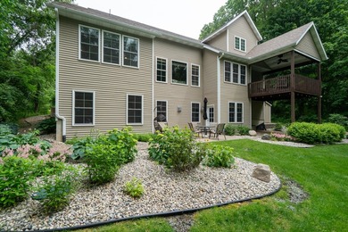 Welcome to this exceptional two-story walkout nestled on a - photo 49