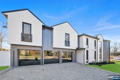 Located on Roberts Road, one of Englewood Cliffs' premier - photo 3