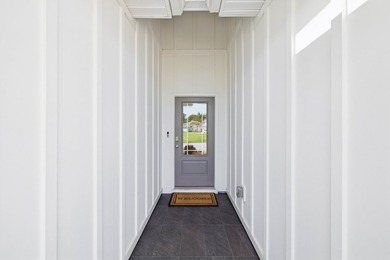 Located on a builder-designated premium lot in the more private - photo 5