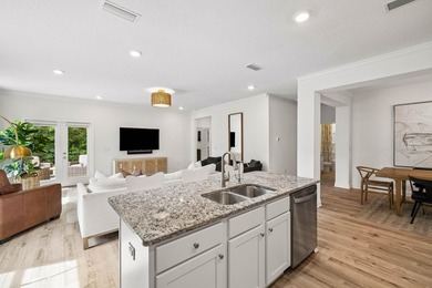 Located on a builder-designated premium lot in the more private - photo 10