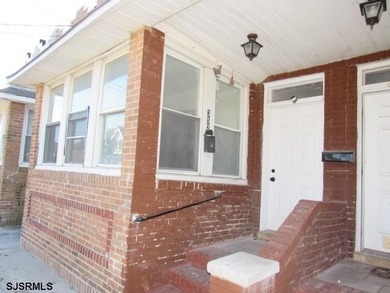 Spacious 4-bedroom, 2-bath attached single-family home located - photo 3