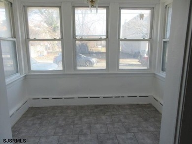 Spacious 4-bedroom, 2-bath attached single-family home located - photo 8