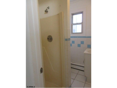 Spacious 4-bedroom, 2-bath attached single-family home located - photo 9
