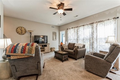 This inviting zero-entry condo offers both comfort and