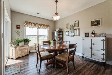 This inviting zero-entry condo offers both comfort and