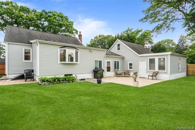 Welcome to this charming Cape-style home nestled on a quiet - photo 19