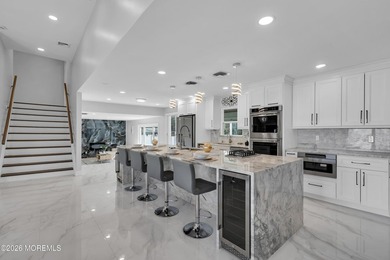 This fully renovated home sits on just under 2 acres with a pool - photo 1