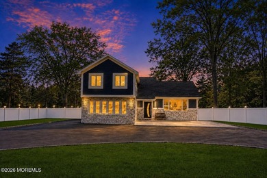 This fully renovated home sits on just under 2 acres with a pool - photo 2