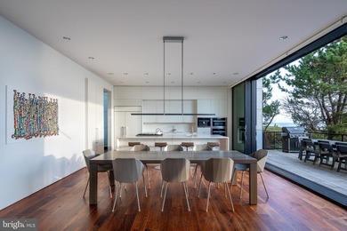 A singular achievement in modern coastal architecture, this - photo 4