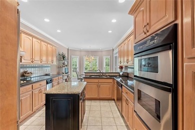 This exquisite four-sided blush brick estate is the epitome of - photo 21